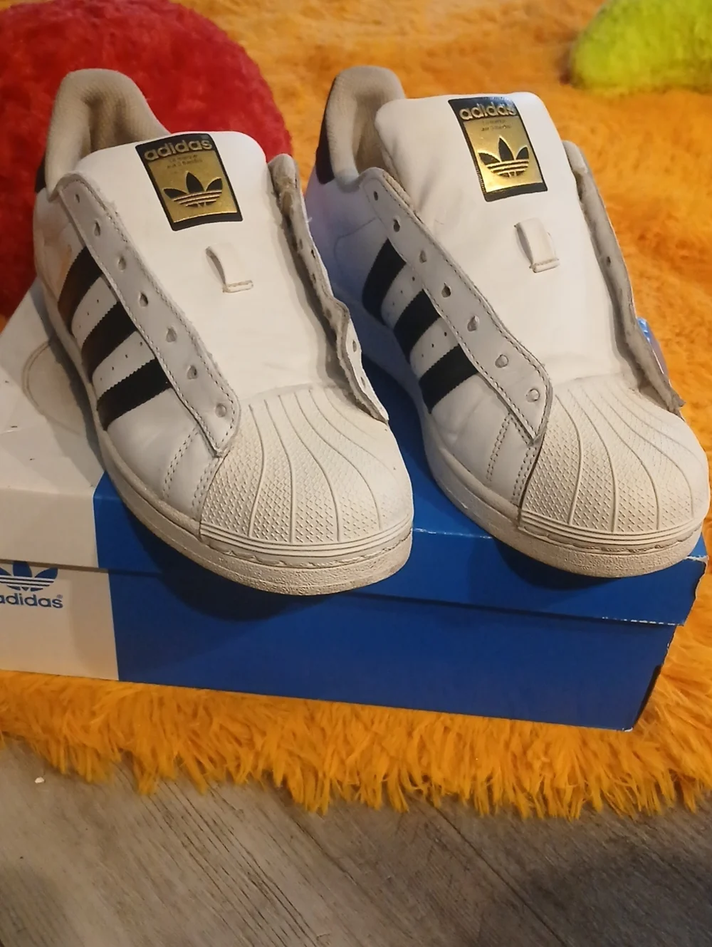 adidas Men's White Superstar Sneakers with Black Stripes